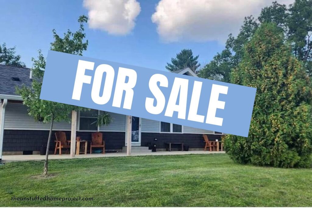 Image of home with "for sale" text overlay for deciding is it time to sell your home.