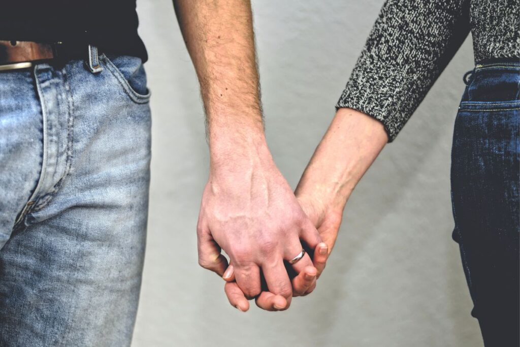 couple holding hands on date night ideas